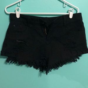 Distressed black jean shorts cheeky